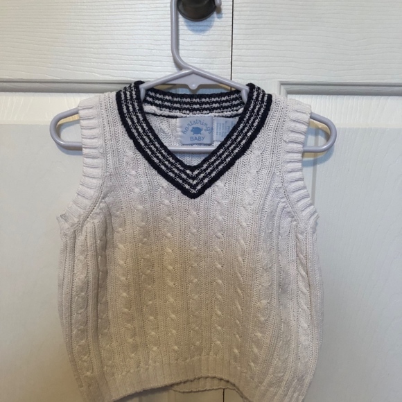 White Vest with blue detail at collar line. - Picture 1 of 6